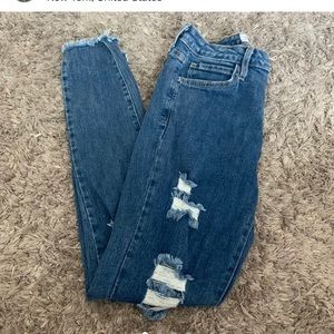 distressed blue skinny jeans